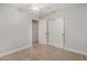 Neutral bedroom with carpet and view into bathroom at 17406 N 28Th Dr, Phoenix, AZ 85053
