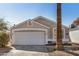Charming single-story home with a two-car garage, desert landscaping and a new coat of exterior paint at 17406 N 28Th Dr, Phoenix, AZ 85053