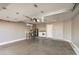 Spacious garage with washer, dryer, storage shelving, and door to the interior at 17406 N 28Th Dr, Phoenix, AZ 85053