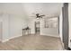 Open-concept living room featuring tile flooring and neutral walls at 17406 N 28Th Dr, Phoenix, AZ 85053