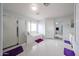 Bright bathroom featuring a glass-enclosed shower, soaking tub, and modern fixtures at 17687 W Surrey Dr, Surprise, AZ 85388
