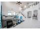 Spacious living room with high ceilings, marble floors, comfortable seating, and elegant decor at 17687 W Surrey Dr, Surprise, AZ 85388