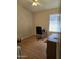 Simple bedroom with laminate floors, neutral walls, a window, and a desk at 17821 N Woodrose Ave, Surprise, AZ 85374