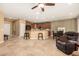 Open-concept living space with a kitchen, dining area, and comfortable seating at 20515 N 271St Ave, Buckeye, AZ 85396