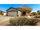 An exterior view of the front of the single Gathering home at 22727 W Papago St, Buckeye, AZ 85326