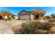 An exterior view of the front of the single Gathering home at 22727 W Papago St, Buckeye, AZ 85326