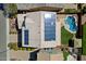 Aerial view of home featuring solar panels, a pool, and a well-maintained backyard at 2517 W Balao Dr, Phoenix, AZ 85085