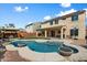 Expansive backyard with a pool, gazebo, and lush lawn, ideal for relaxation and entertainment at 2517 W Balao Dr, Phoenix, AZ 85085