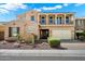 Beautiful two-story home featuring desert landscaping and a charming balcony at 2517 W Balao Dr, Phoenix, AZ 85085