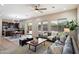 Open-concept living area connecting the kitchen and offering backyard views at 2517 W Balao Dr, Phoenix, AZ 85085