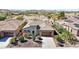 Aesthetic aerial view of desert home with attractive desert landscaping and a two car garage at 29534 N 128Th Ln, Peoria, AZ 85383