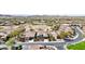Attractive aerial view of desert homes showcasing a nearby golf course in the community at 29534 N 128Th Ln, Peoria, AZ 85383