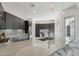 Open kitchen with granite countertops, stainless steel appliances, and seamless integration to the dining area at 29534 N 128Th Ln, Peoria, AZ 85383