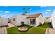 Private backyard with a fire pit, grill, and covered patio ideal for outdoor living at 2629 S Country Club Way, Tempe, AZ 85282