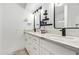 Modern bathroom featuring dual sinks, ample counter space, and stylish lighting at 2629 S Country Club Way, Tempe, AZ 85282