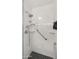 Modern bathroom featuring a shower with glass enclosure and luxurious marble tile accents at 2629 S Country Club Way, Tempe, AZ 85282