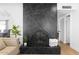 Elegant black marble fireplace adds a touch of luxury to the living space at 2629 S Country Club Way, Tempe, AZ 85282