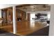 Large event space with hardwood floors, fireplace and tables with chairs at 2650 W Union Hills Dr # 272, Phoenix, AZ 85027