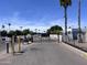 Gated entrance to the community with palm trees in the background at 2650 W Union Hills Dr # 272, Phoenix, AZ 85027