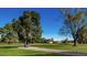 Lush green space featuring mature trees and well-maintained landscaping provides a serene outdoor setting at 2650 W Union Hills Dr # 272, Phoenix, AZ 85027