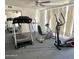 Community gym with treadmills, elliptical, recumbent bike, and mirrors at 2650 W Union Hills Dr # 272, Phoenix, AZ 85027