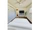 Well-lit bedroom featuring a comfortable bed, a ceiling fan, and ample closet space for optimal organization and relaxation at 2650 W Union Hills Dr # 272, Phoenix, AZ 85027