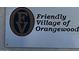 Sign that reads Friendly Village of Orangewood with the community logo at 2650 W Union Hills Dr # 272, Phoenix, AZ 85027