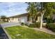 Residential street with single-story homes, featuring two-car garages and well-maintained landscaping at 2662 S Springwood Blvd # 341, Mesa, AZ 85209