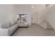 Bright living room with soaring ceilings, and a staircase at 3234 E Marco Polo Rd, Phoenix, AZ 85050