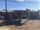 Barbecue featuring a brick oven, covered seating, and gravel landscaping at 3307 W Ocotillo Rd, Phoenix, AZ 85017