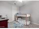 room with a loft bed and a colorful rug at 3522 E Spring Wheat Ln, Gilbert, AZ 85296