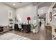 Cozy home office with neutral walls, wood-look floors, and modern decorative accents at 3522 E Spring Wheat Ln, Gilbert, AZ 85296