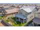Aerial view of the backyard of a home featuring a pergola, artificial turf, and patio at 3830 E Appaloosa Rd, Gilbert, AZ 85296