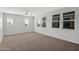 Large bedroom with carpet flooring, a ceiling fan, and natural lighting at 3830 E Appaloosa Rd, Gilbert, AZ 85296