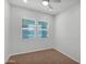 Well-lit bedroom with neutral walls, carpet, and a ceiling fan at 3830 E Appaloosa Rd, Gilbert, AZ 85296