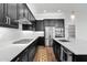 Gourmet kitchen features a large island, stainless steel appliances, and a gas cooktop at 3830 E Appaloosa Rd, Gilbert, AZ 85296