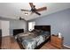Bedroom with a ceiling fan and hardwood floors at 4631 W Mcrae Way, Glendale, AZ 85308