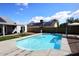 The backyard has a refreshing pool, a gazebo, solar panels, and an artificial lawn at 4631 W Mcrae Way, Glendale, AZ 85308
