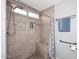 Updated tiled shower with a built in bench at 4631 W Mcrae Way, Glendale, AZ 85308