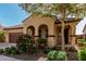 Attractive single-story home with a covered entryway and mature landscaping at 4695 N 204Th Ave, Buckeye, AZ 85396
