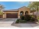 Charming single-story home with desert landscaping and a two-car garage at 4695 N 204Th Ave, Buckeye, AZ 85396