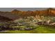 Golf course view of elevated lot with beautiful desert landscape and mountain views at 4695 N 204Th Ave, Buckeye, AZ 85396