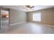 This bedroom features wood-look floors, window, and ceiling fan at 4873 E Magnus Dr, San Tan Valley, AZ 85140