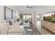 Inviting living room with a comfortable sofa, decorative rug, and ample natural light at 5202 E Marconi Ave, Scottsdale, AZ 85254