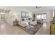 Cozy living room with a plush sectional, decorative pillows, and stylish decor at 5202 E Marconi Ave, Scottsdale, AZ 85254