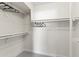 Spacious walk-in closet with ample shelving and hanging space at 5202 E Marconi Ave, Scottsdale, AZ 85254