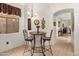 Inviting dining area with a decorative table, chairs, and stylish lighting at 5370 S Desert Dawn Dr # 39, Gold Canyon, AZ 85118