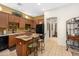 Well-equipped kitchen features a center island with seating and ample cabinet space for storage and functionality at 5370 S Desert Dawn Dr # 39, Gold Canyon, AZ 85118