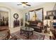 This comfortable living room features a view of the patio and a beautifully decorated interior at 5370 S Desert Dawn Dr # 39, Gold Canyon, AZ 85118