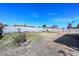Vast backyard featuring block and wood fencing with plenty of space to landscape or add a pool at 7044 W Sierra St, Peoria, AZ 85345